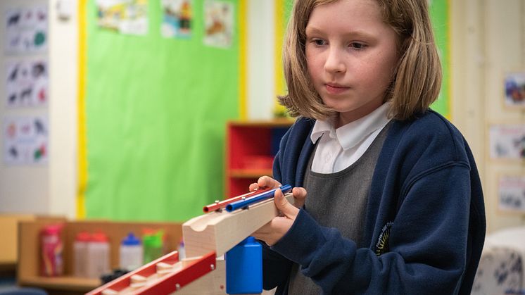 Battle Hill Primary School pupil Caitlyn Bestford taking part in one of NUSTEM's workshops