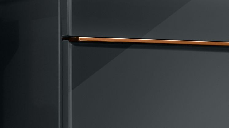 Elegant metal and dark on-trend colours to create beautiful bathrooms