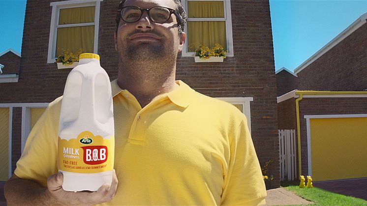 Arla brings bold bursts of yellow to a town called compromise in new TV ad for Arla "Best of Both" milk