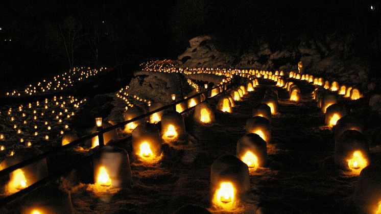 Snow Huts at Yunishigawa Onsen Aglow Past Dusk