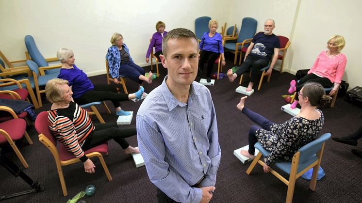 Dr Garry Tew with participants in a yoga class in Harrogate