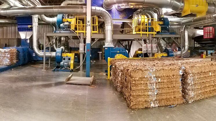 Controlling Dangerous Dusts from Cardboard and Paper Scrap while Minimizing Energy Costs