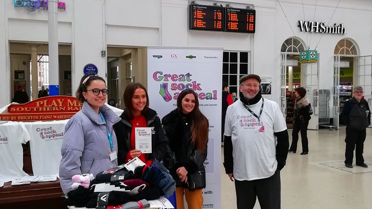 Volunteers last year collecting sock donations at Brighton station