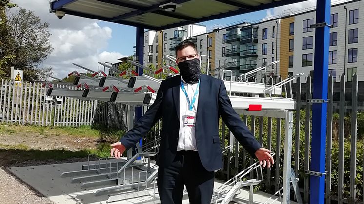 Solar cycle: Station Manager James Miller welcomes passengers to one of GTR's new bike shelters with solar-powered security lighting