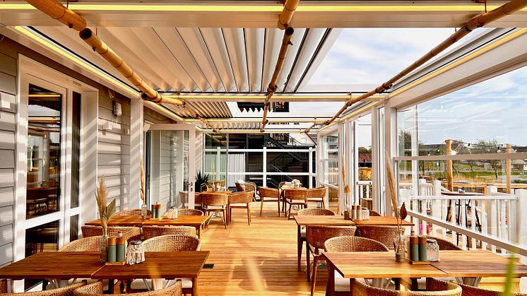 Stylische Terrassen-Erweiterung fürs ganze Jahr im The Cove