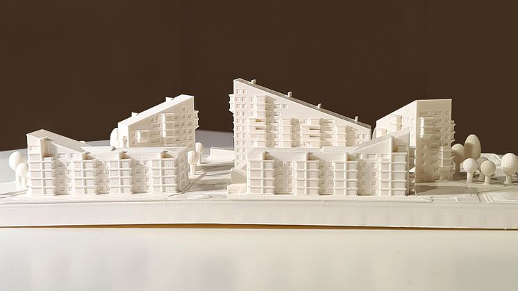 Arkitekturen på  Luleås nya hyreshus längst ut på Malmudden formas av närhet till Skurholmsfjärden, utsikt och inte minst gångna tiders i grannskapet lutande malmhögar. Bild: Ahlqvist & Almqvist Arkitekter AB