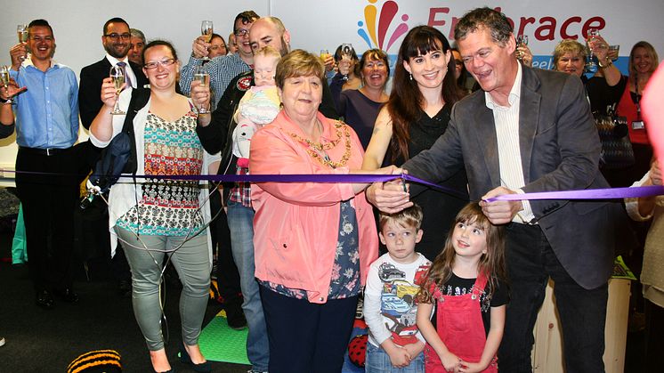 I declare this centre open: MP Stephen Lloyd with Embrace founder Rebecca Whippy (to his left, flanked by the local Mayor), cut a ribbon on a new children's therapy centre next door to Eastbourne railway station