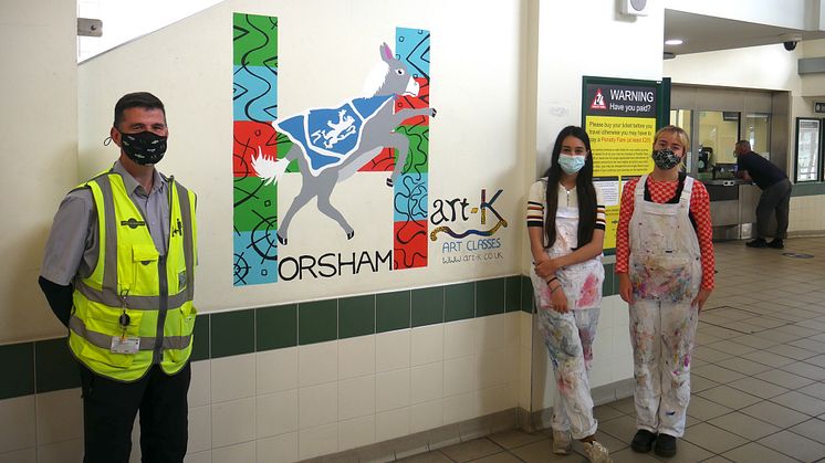 Horsham Station Assistant Mike O'Grady with mural artists Ayseli Sunguroglu (centre) and Laura Hutchins (right)
