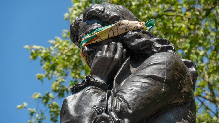 Bristol / England - May 6th 2020: Statue of Edward Colston with blindfold before it was taken down by protestors. Image from Shutterstock by Ian Luck
