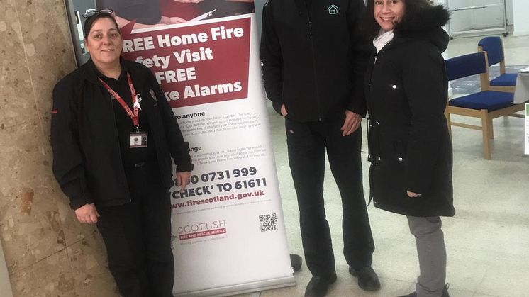 Catherine Wallace, Community Action Team SFRS, Mito Alvarez-Liddell, ng2 Estate Services Foreman, and Helen Carroll, Chair of Springburn Central Community Council at the Community Hub in Springburn Shopping Centre 