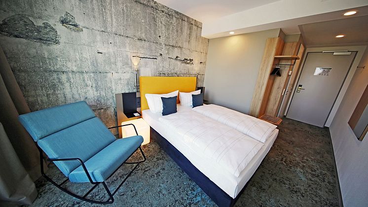 Das Superior-Zimmer mit stylischer Betontapete