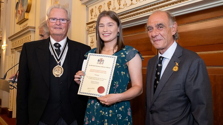 Laura Watson with Master Glover Clive Hawkins (left) and Robert Yentob, Chairman of Dents of Warminster and holders of the Royal Warrant.