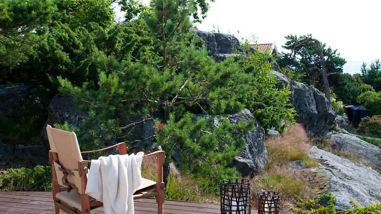 Fargesett terrassen din ut fra omgivelsene. TREBITT Terrassebeis i fargen 90000 Terrassebrun.