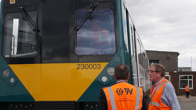 Jan Chaudhry-van der Velde and Adrian Shooter at Long Marston to unveil with special livery for the upcoming Class 230 units