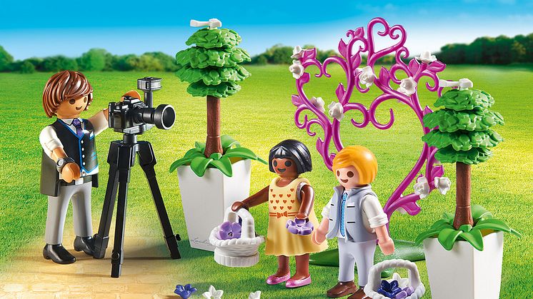 Fotograf mit Blumenkindern