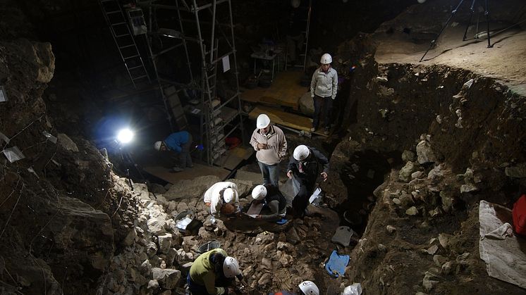 Excavation of Neolithic human remains at the Portalon cave.