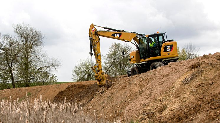 Cat M317F hjulgrävare i arbete