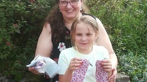 Lynn and daughter Izzy, who have been making face coverings to help protect colleagues and customers