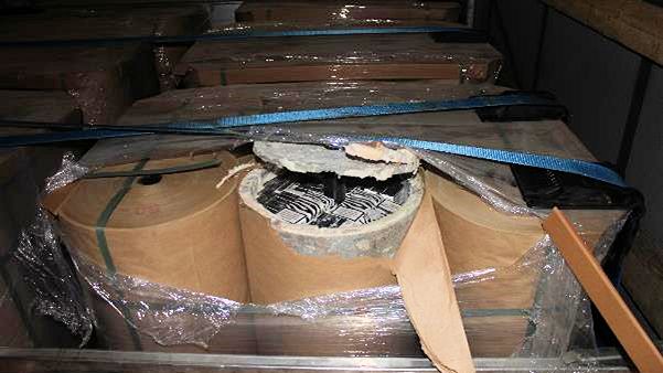 Cigarettes hidden inside asbestos and concrete tubes (SE 19.17)