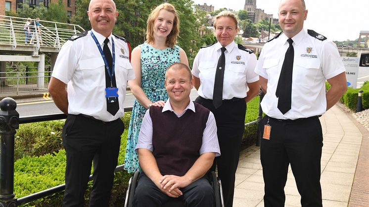 Dr Colin Richardson, front, with l-r Paul Cummings (Group Manager for Training), Juliet Kele (Northumbria University), Sarah Nattress Director of Emergency Response), Justin Parry (Group Manager of Emergency Response).