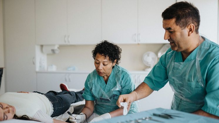 Två läkare och en patient