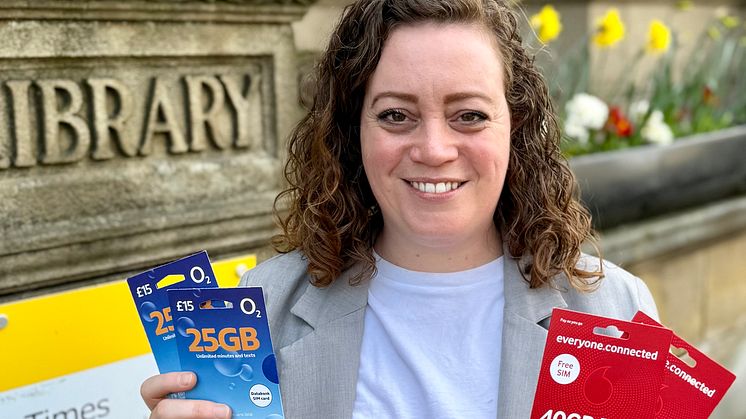 Cllr Charlotte Morris with the free SIM cards.