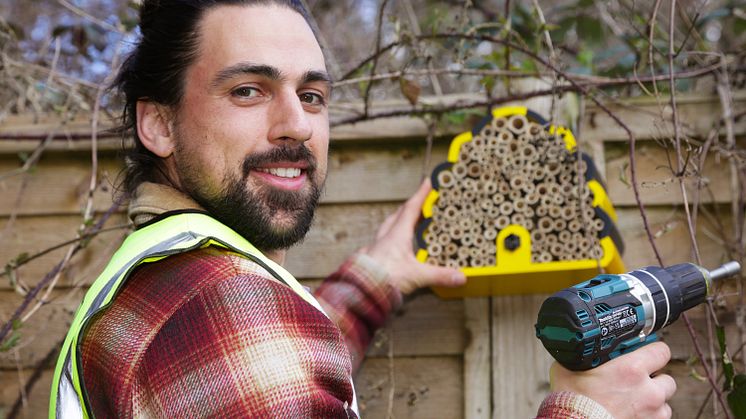 Sid Sharpe from the Bee Friendly Trust puts up a 'bee hotel' at Glynde station. There are pictures from Plumpton, Berwick, Coulsdon South and Purley below