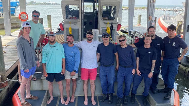 Five survivors pictured after boat sinking rescue with US Coast Guards