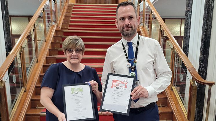 Caron Longden, head of business development at Food For Life, and Andrew Cowan, senior operations manager, Bury Catering.