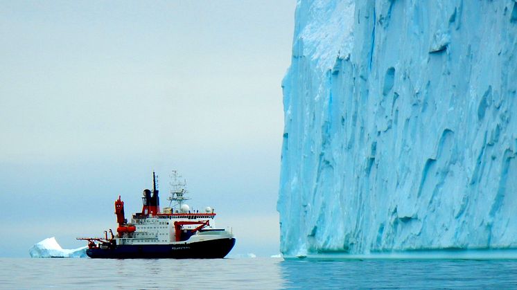The RV Polarstern in front of a huge iceberg in Pine Island Bay (Credit: J Klages, AWI)