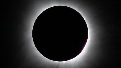 A picture of a solar eclipse taking place.  