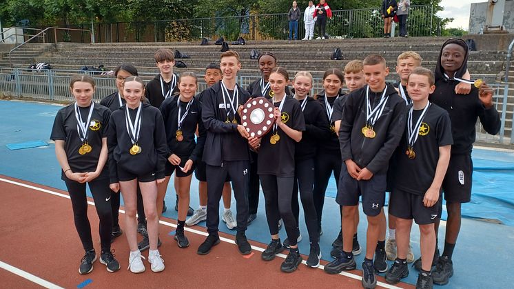 Students from Eastbank Academy celebrate their win at the 2024 ng Classics Athletic final. 
