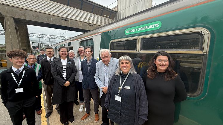 (R-L) Sophie Marks (competition winner), Cara Higgs (LNR), Peter Griffiths (competition winner) alongside reps from Bletchley Park and the local community group.