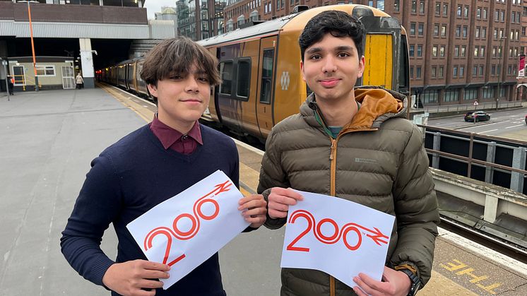 Fabrizio Mihailescu, 16, (left) and Abhay Sangwan, 17, (right) launch the “Visit 200” website with West Midlands Railway at Birmingham Snow Hill station