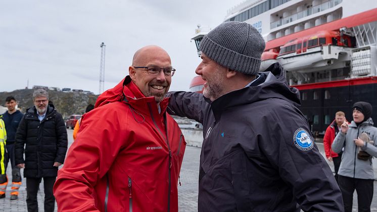 Air Greenland CEO, Jacob Nitter Sørensen, and HX CEO, Daniel Skjeldam, at the partnership ceremony alongside MS Fridtjof Nansen in Nuuk