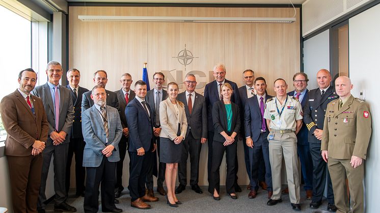 Staff from Systematic and NATO's NCIA at a meeting in Brussels.