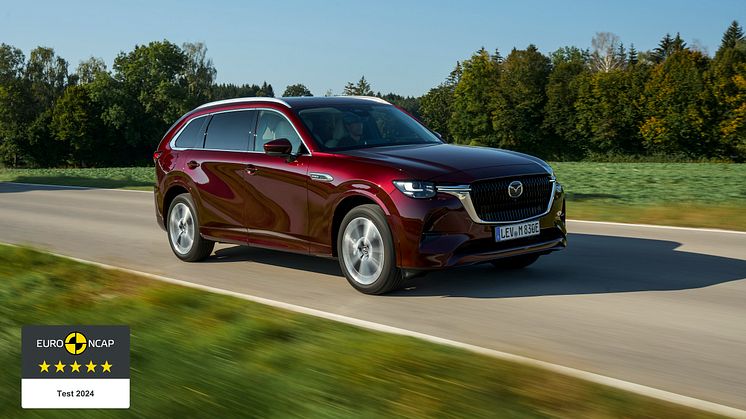 Mazda CX-80 Takumi i färgen Artisan Red