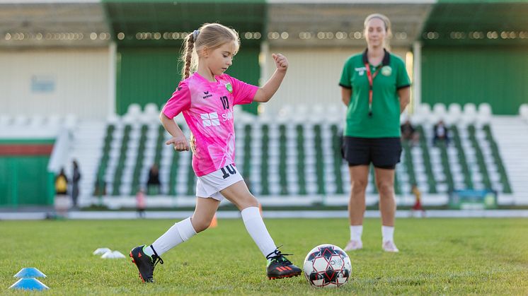 A young girl playing football in Bulgaria