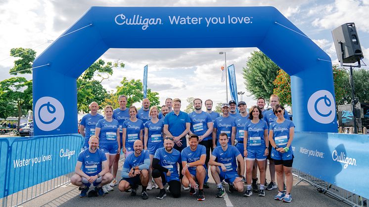 Gruppenfoto vom Team Culligan Deutschland beim Firmenlauf Köln präsentiert von Therme Euskirchen 2025 am Fühlinger See