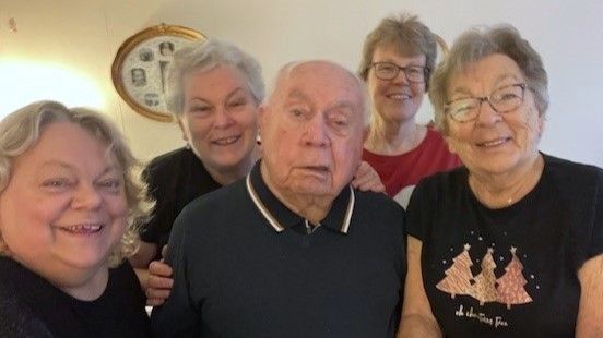 Family man: John Beadle with his wife Audrey, daughters Michele and Jacquie, and family friend Vanda  
