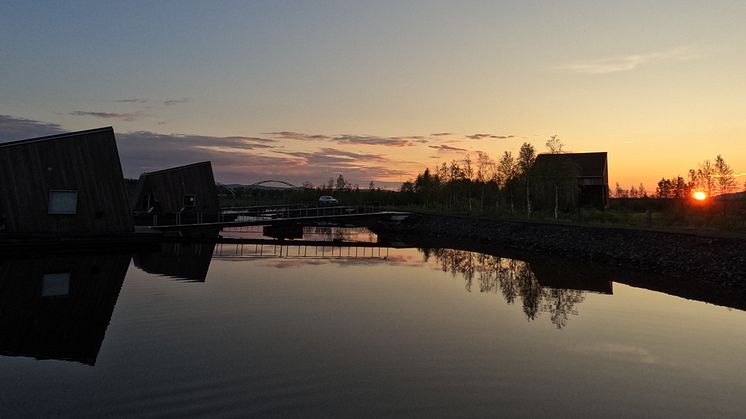 Arctic Bath, mystical and vibrant beneath the midnight sun.