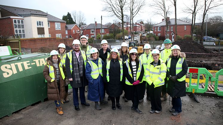 Colleagues and partners of Irwell Valley Homes gather at Willow Street for the ground-breaking ceremony of their new supported housing scheme.