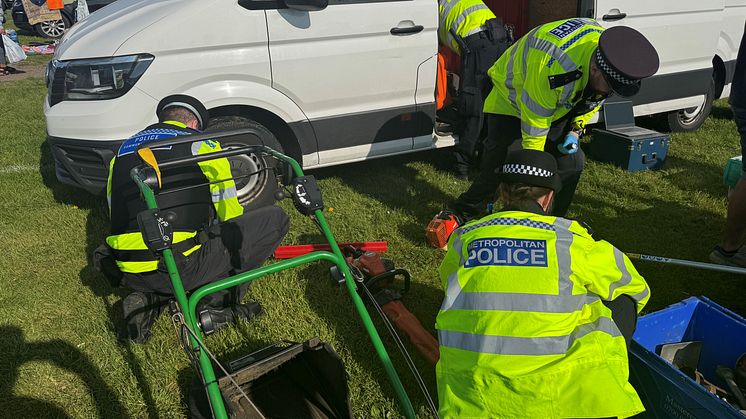 Officers carrying out checks on suspected stolen tools at the Warren Farm Bonzer Boot Sale in Romford