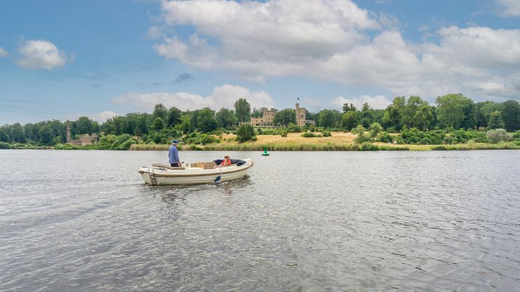 Boat tour through the castle landscape