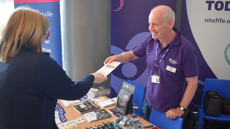 Stroke Association volunteer Neil Murray meets staff at Victoria Hospital Kirkcaldy 