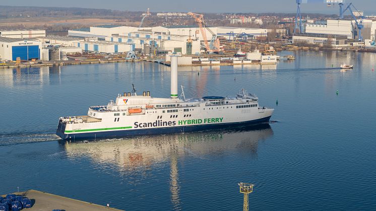 Scandlines hybrid ferry Copenhagen with rotor sail leaving the port of Rostock