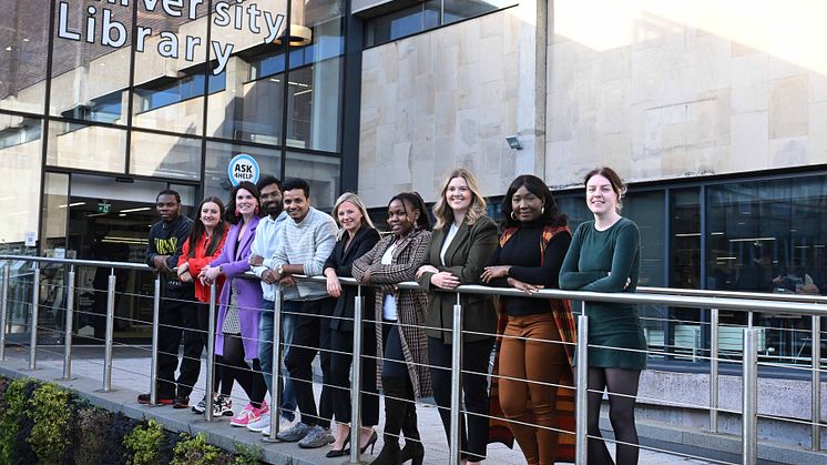 Longstanding corporate supporters, Laura James and Louise Taylor from Enterprise Mobility with staff and students from Northumbria Students Union