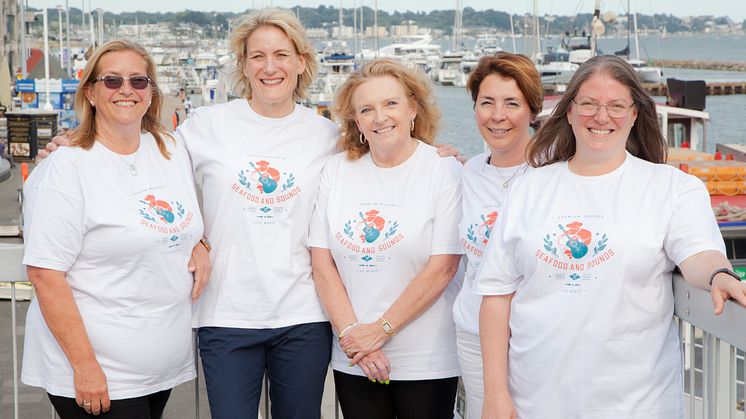 The five founders of Seafood and Sounds pictured on Poole Quay