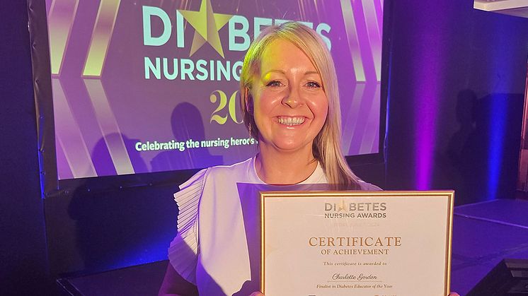 Assistant Professor Charlotte Gordon at the Diabetes Nursing Awards with certificate of achievement