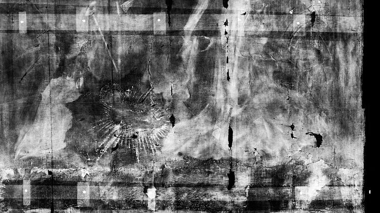 The x-ray image of a nativity scene, discovered under another painting. The baby Jesus can be seen centre left.
